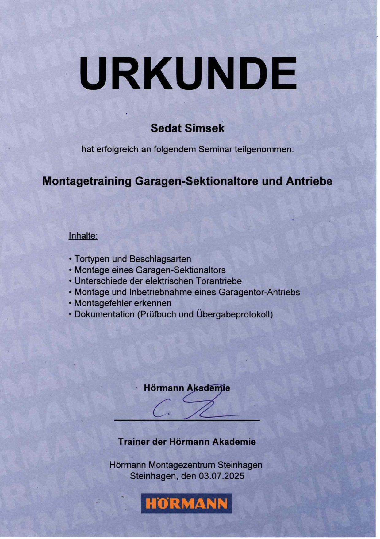 Sedat_Simsek_-_Montagetraining_Garagen-Sektionaltore_und_Antriebe-1.jpg